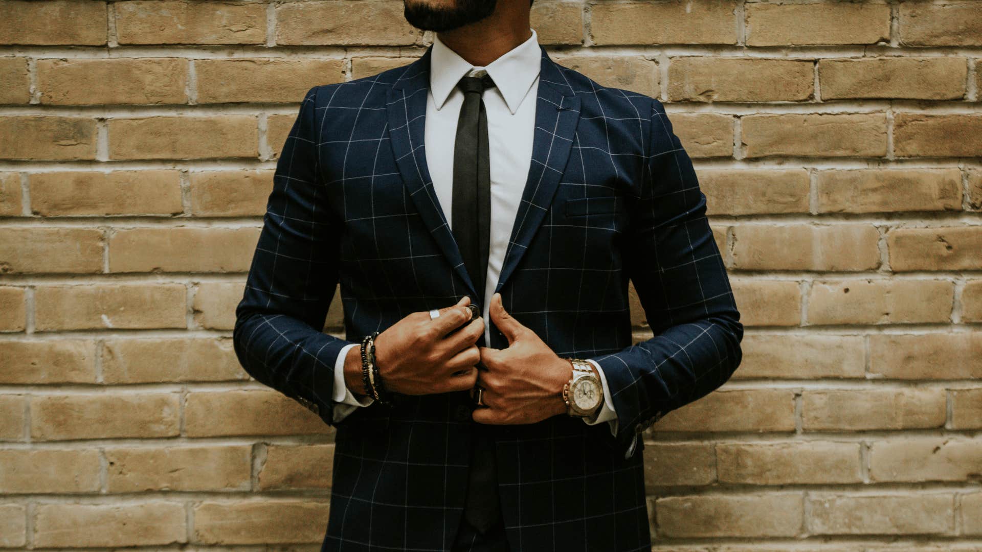 stylish man wearing a sharp outfit