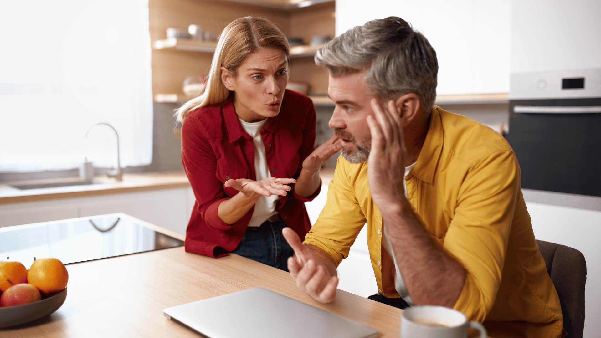 woman arguing with a dejected man