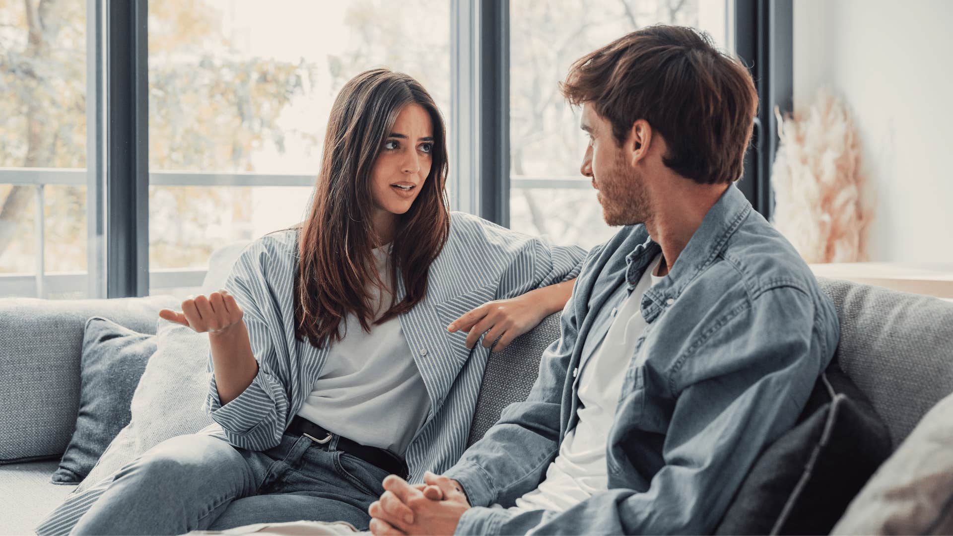 couple talking on the couch