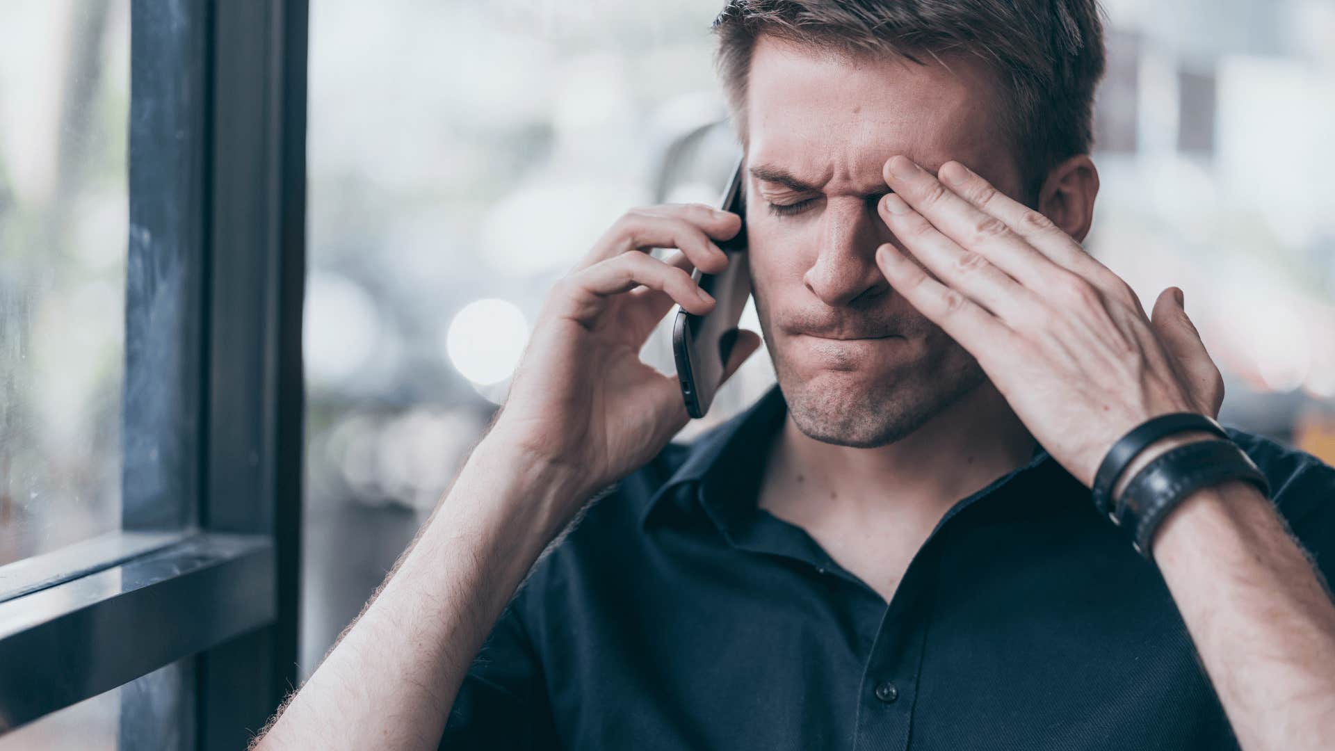 frustrated man on phone call