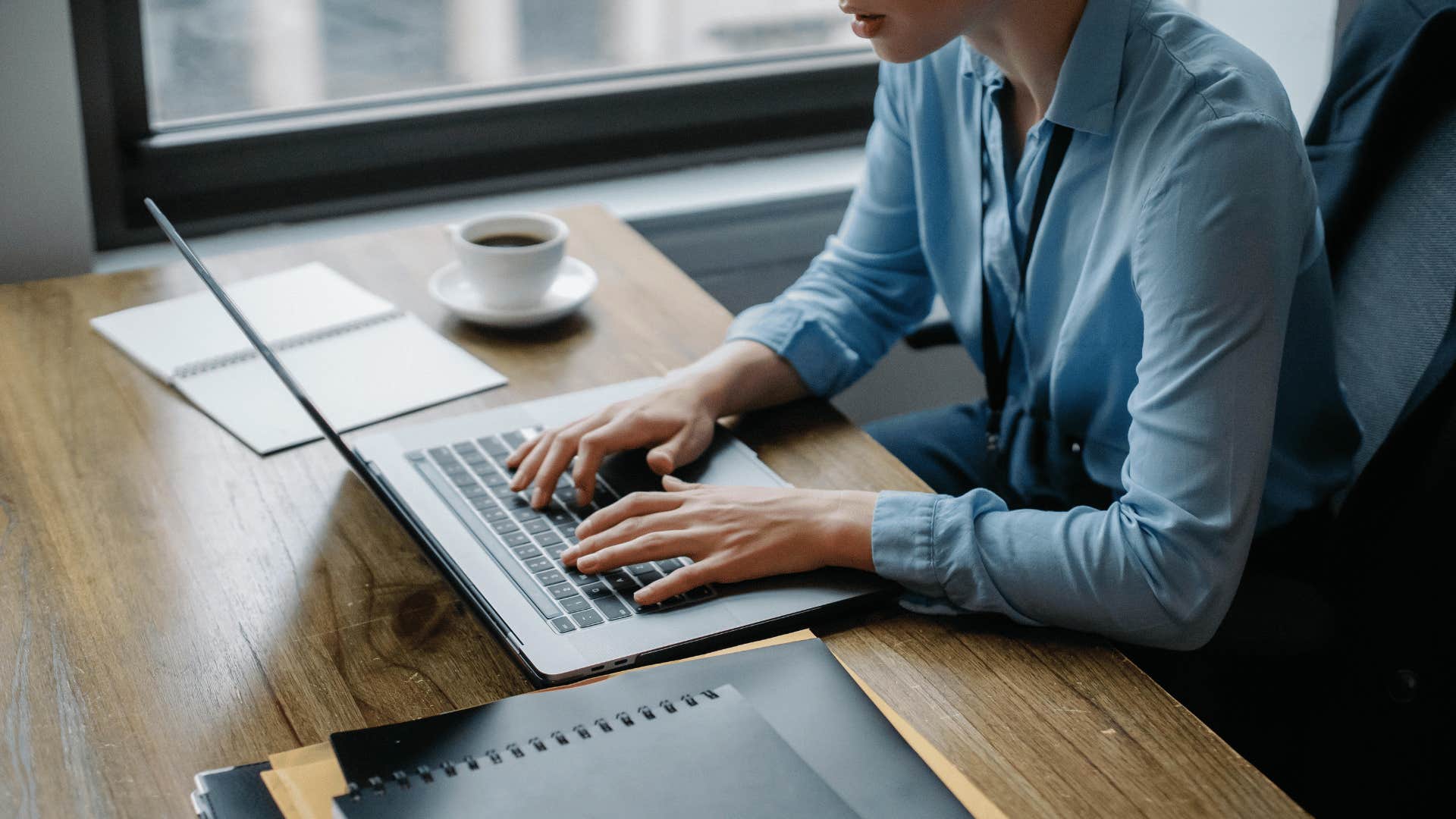 professional woman working on a clean desk