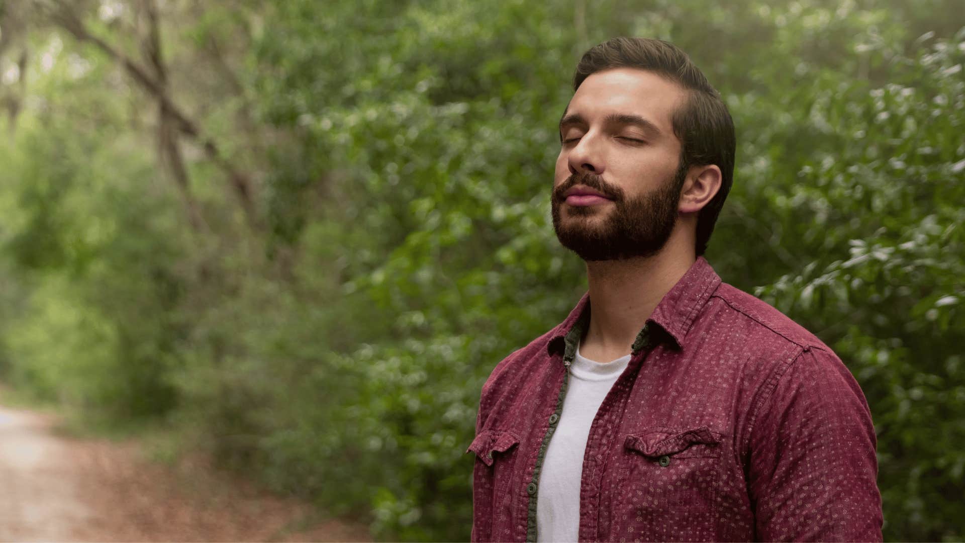 young man breathing in fresh air