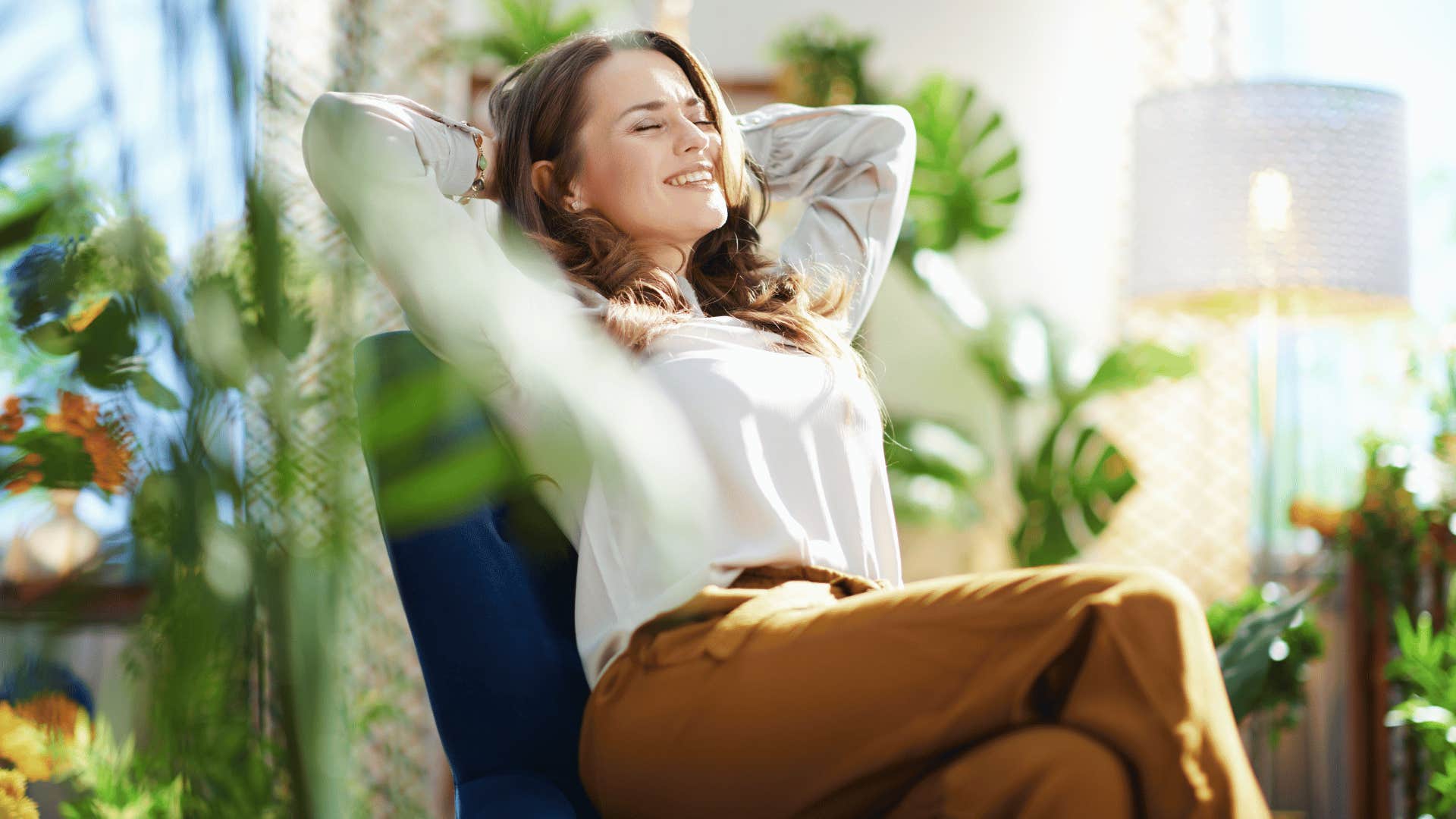 happy woman leaning back and relaxing