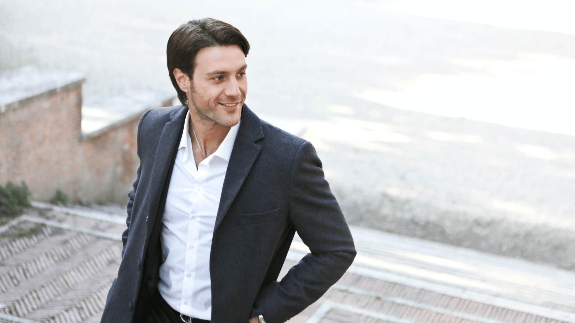 confident man climbing set of stairs