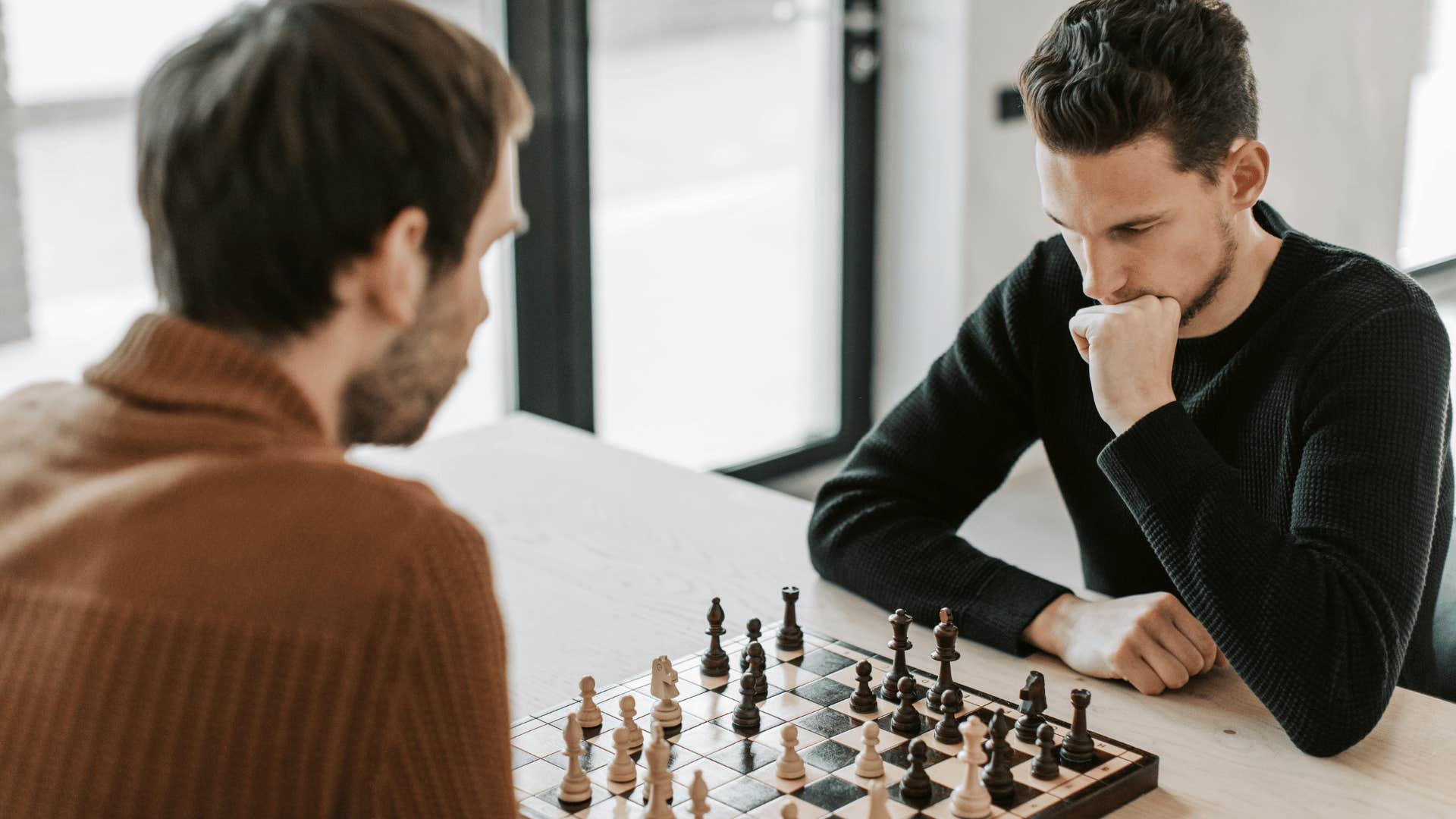 two men playing a game of chess