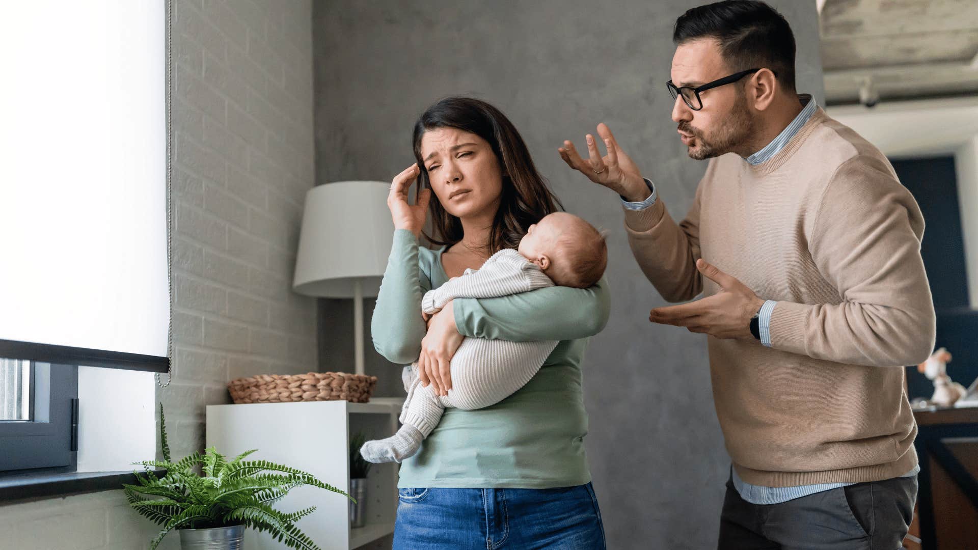 frustrated couple with a newborn