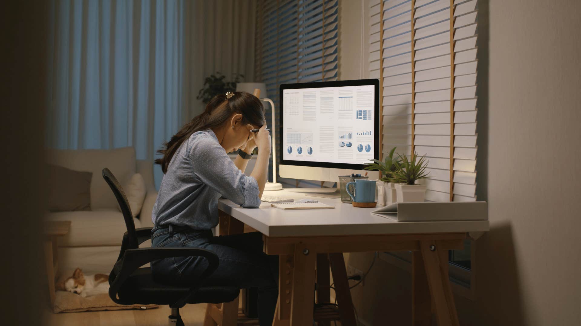 stressed woman working at home