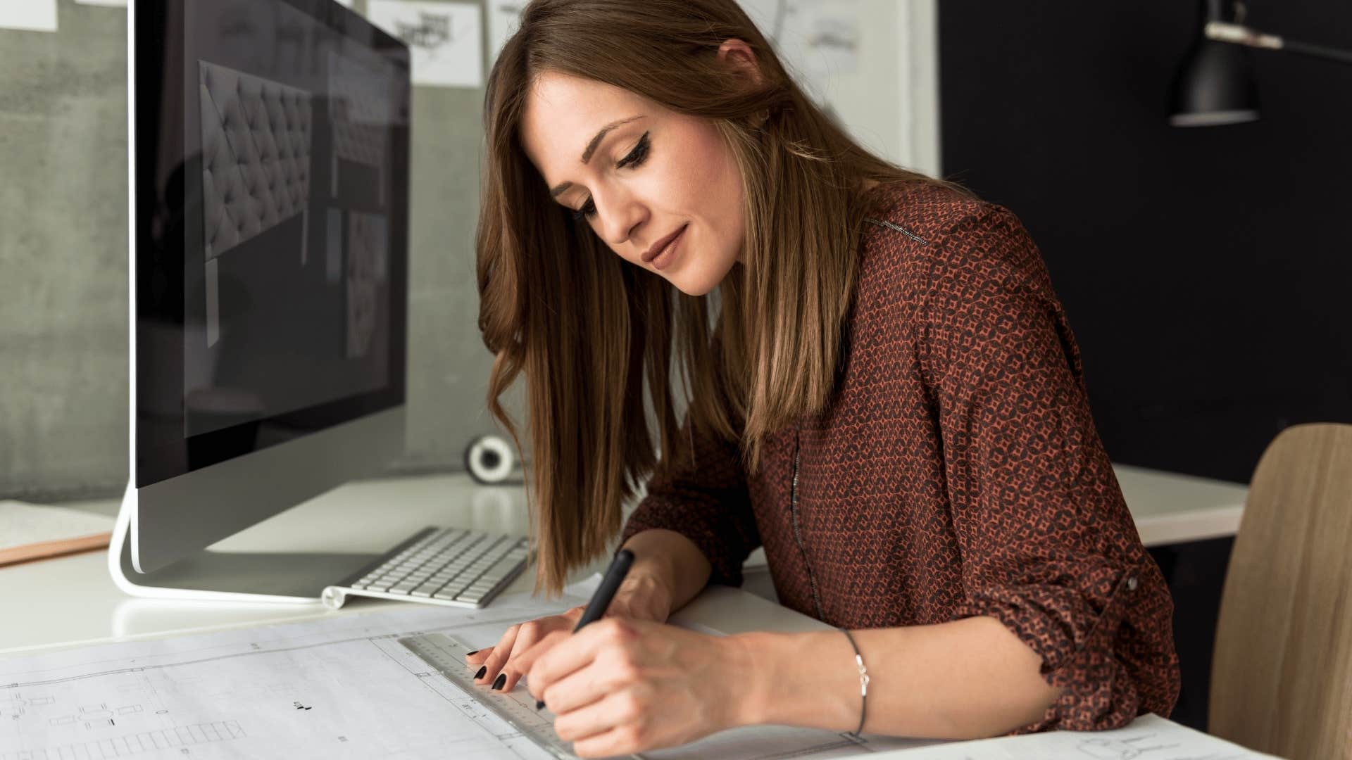 woman working hard on new project