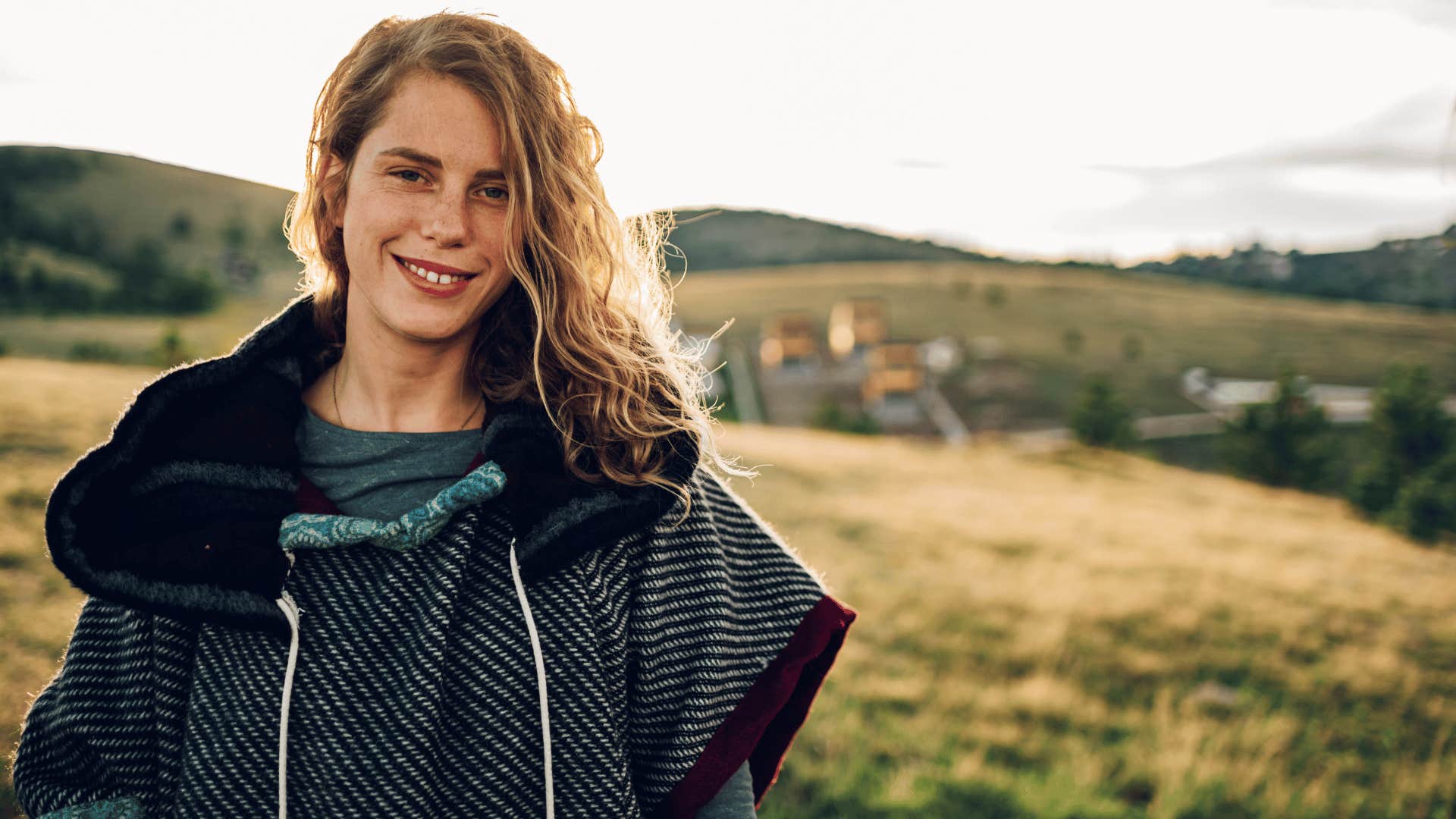 smiling young woman spending time outdoors