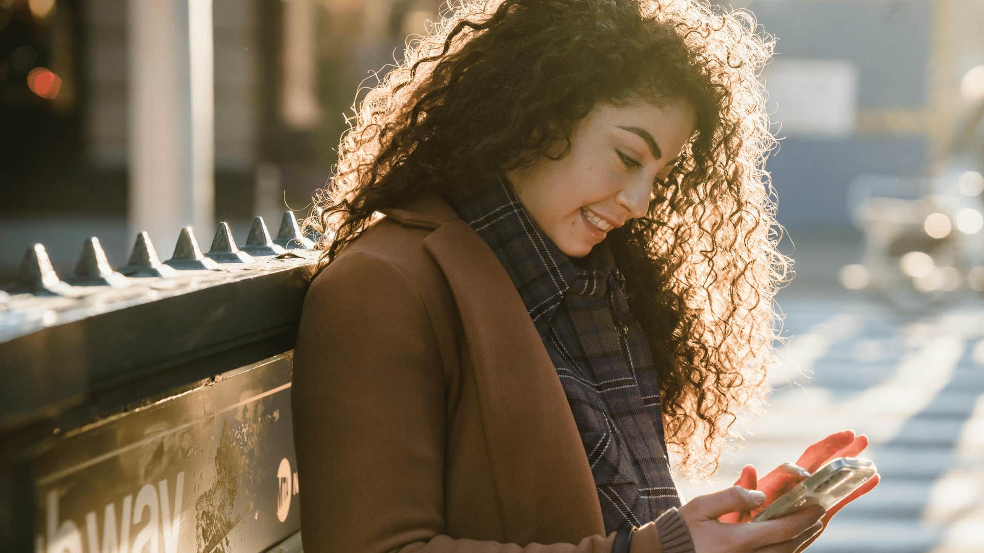 nervous woman texting on phone