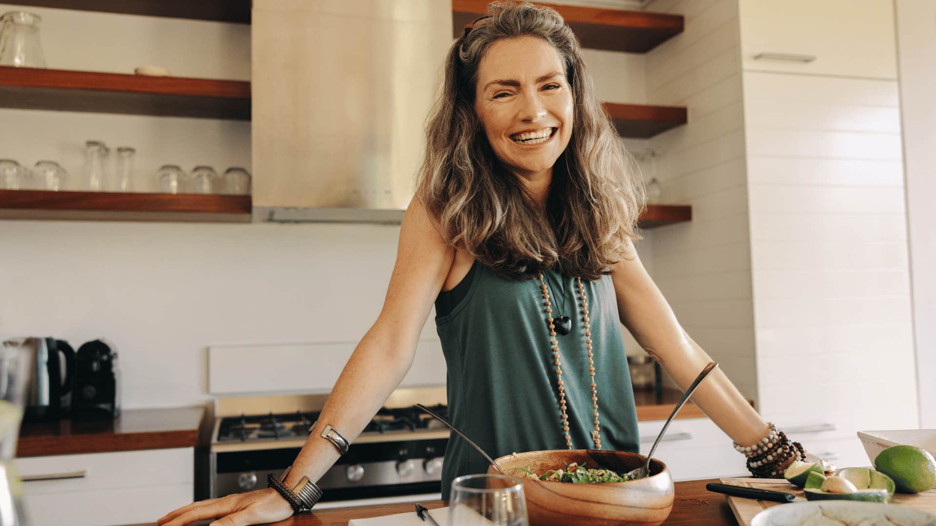 smiling older woman eating healthy