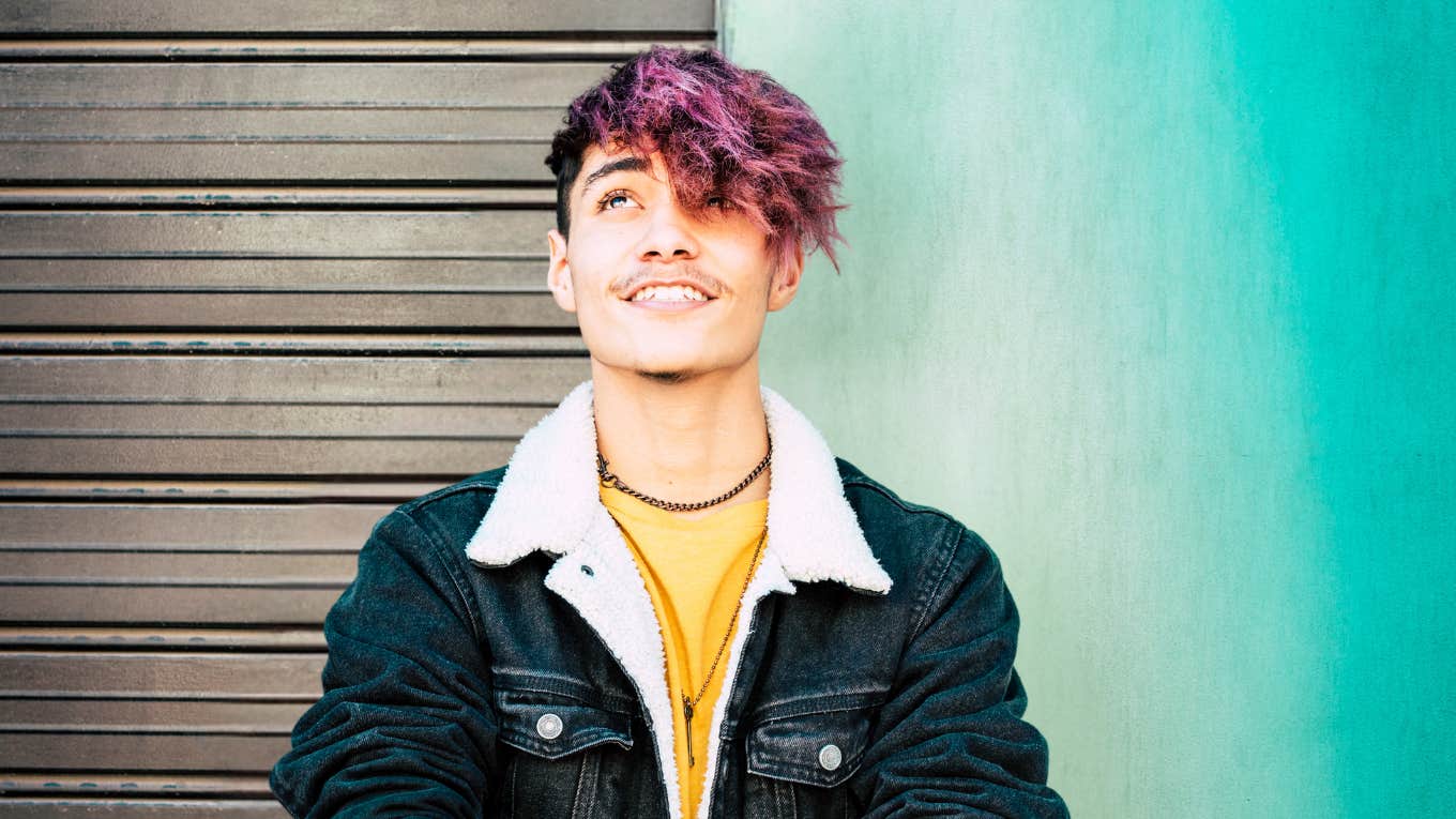 Young man with purple hair learning how to let partner's love feel like enough 