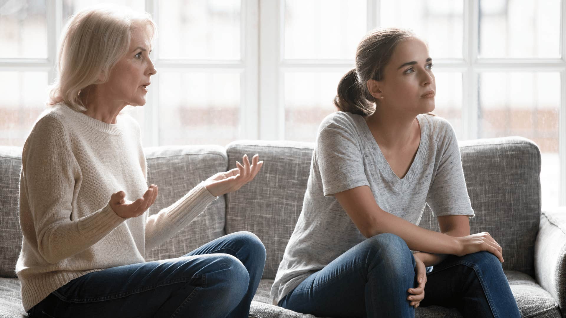 woman turned away and ignoring older woman