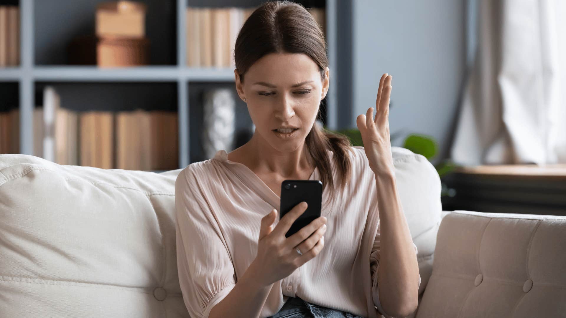 woman screaming at phone