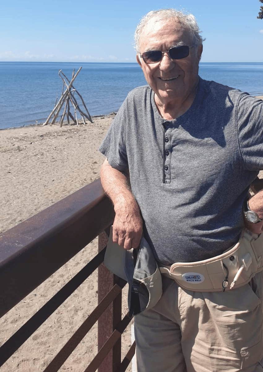 author posing while at the beach