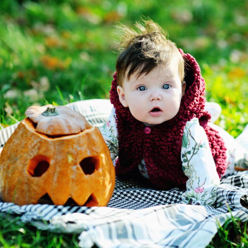 baby with pumpkin