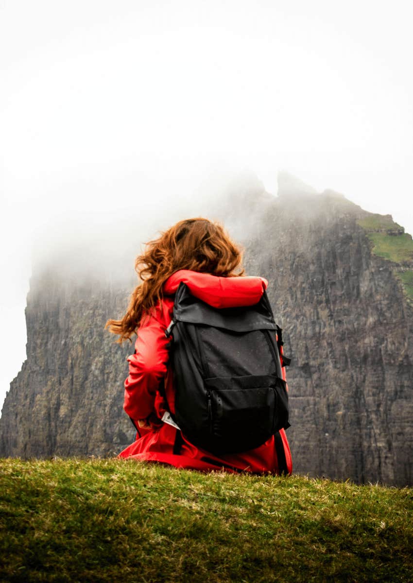 back view of a woman on a solo trip