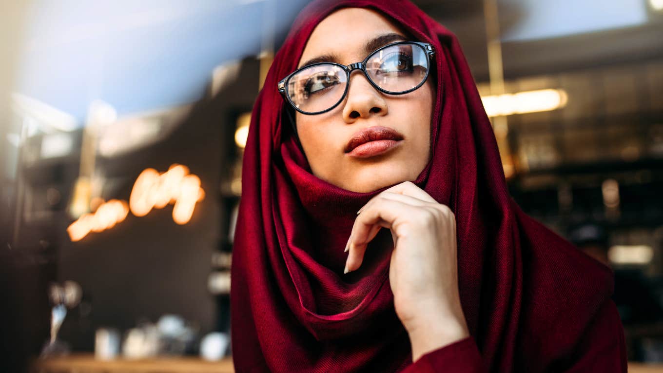 Woman thinking about scheduling a couples therapy session.