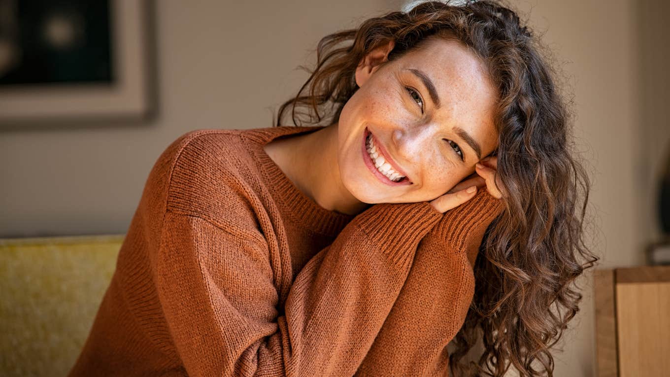 Woman smiling at the camera.