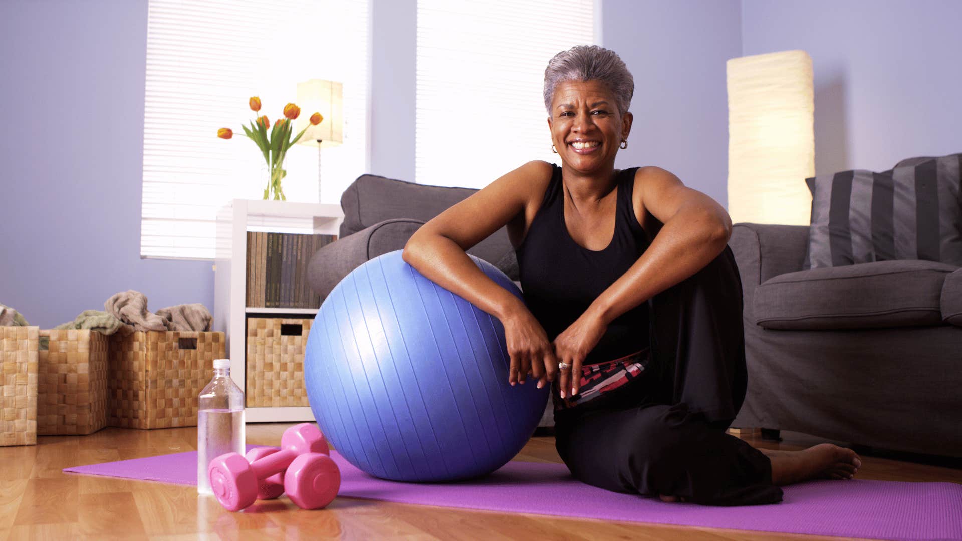 older woman doing yoga