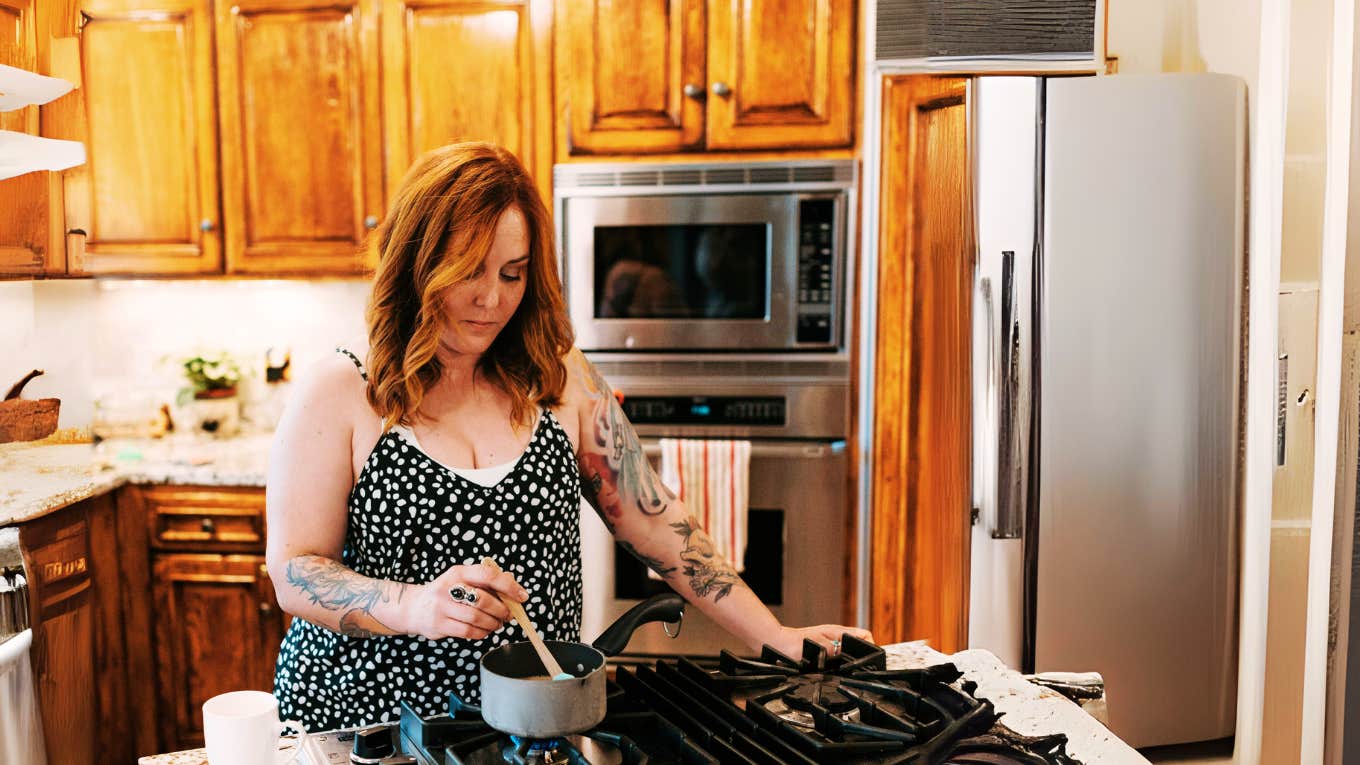 Woman doing basic cooking in kitchen 