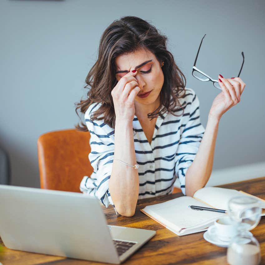 Burnt out corporate pick me worker looking stressed. 