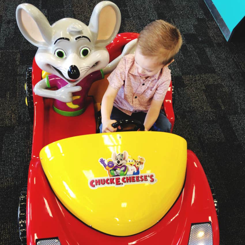 little boy at chuck e cheeses