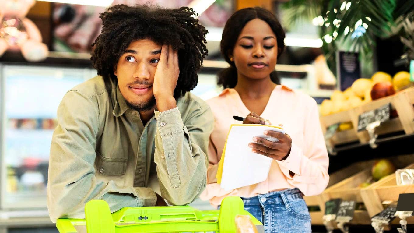 Annoyed husband with his dissatisfied wife at the grocery store