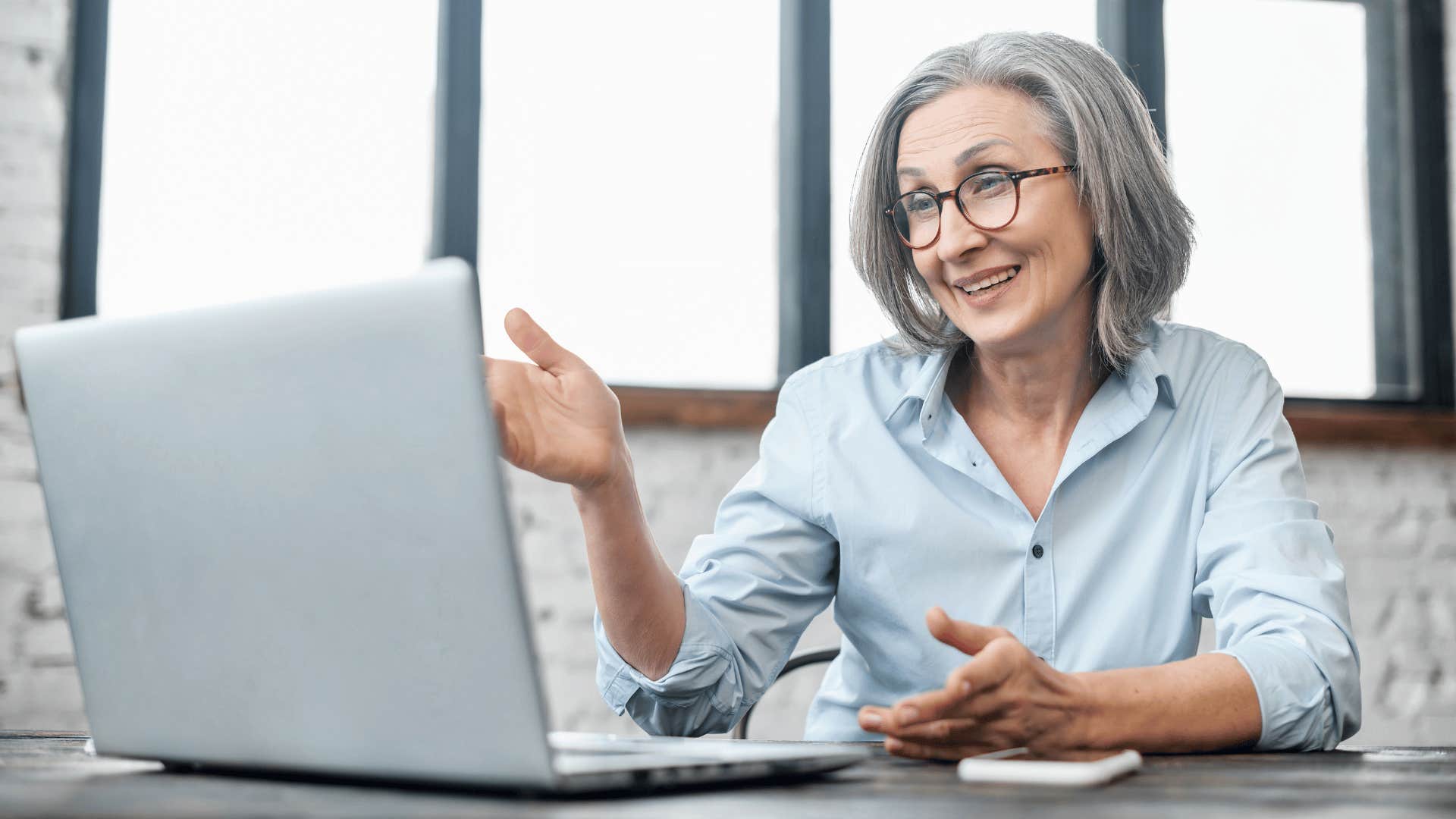 older woman using laptop