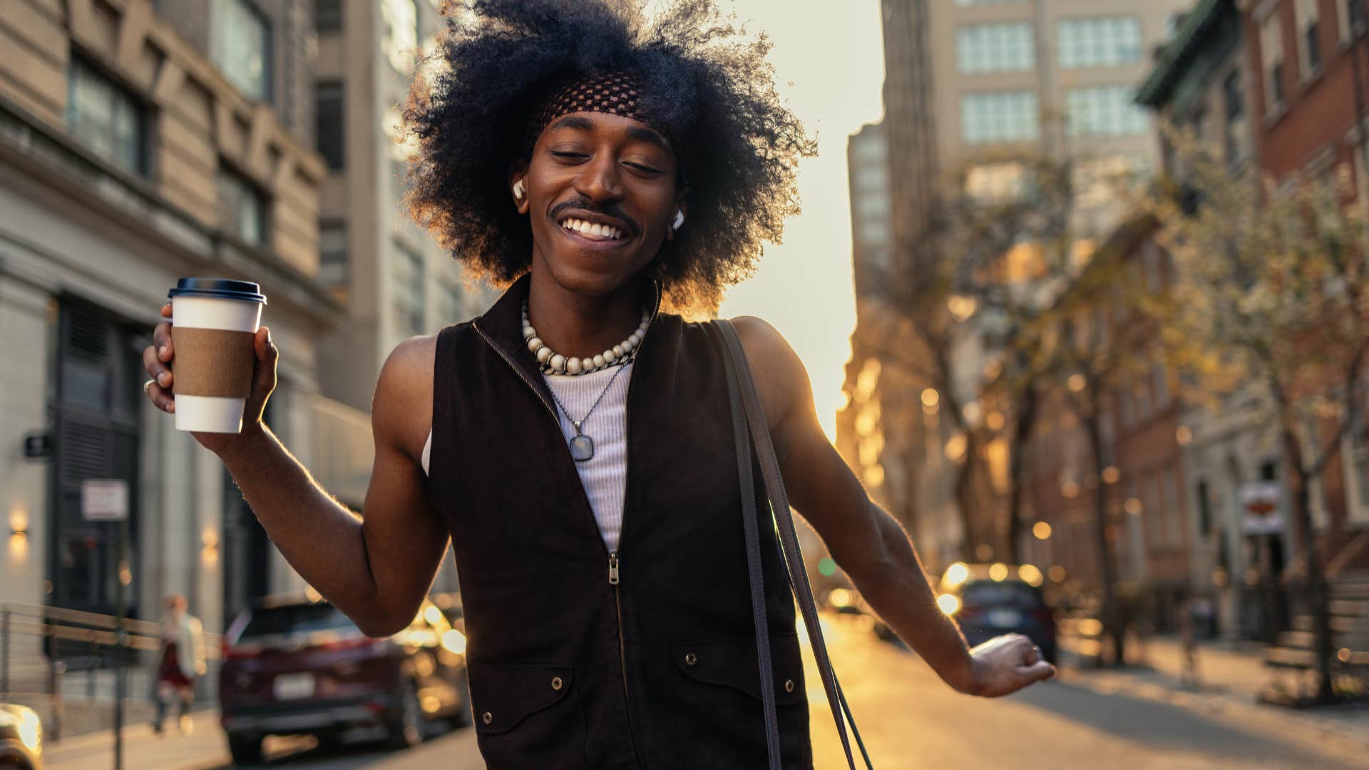 Happy person skipping through the street.