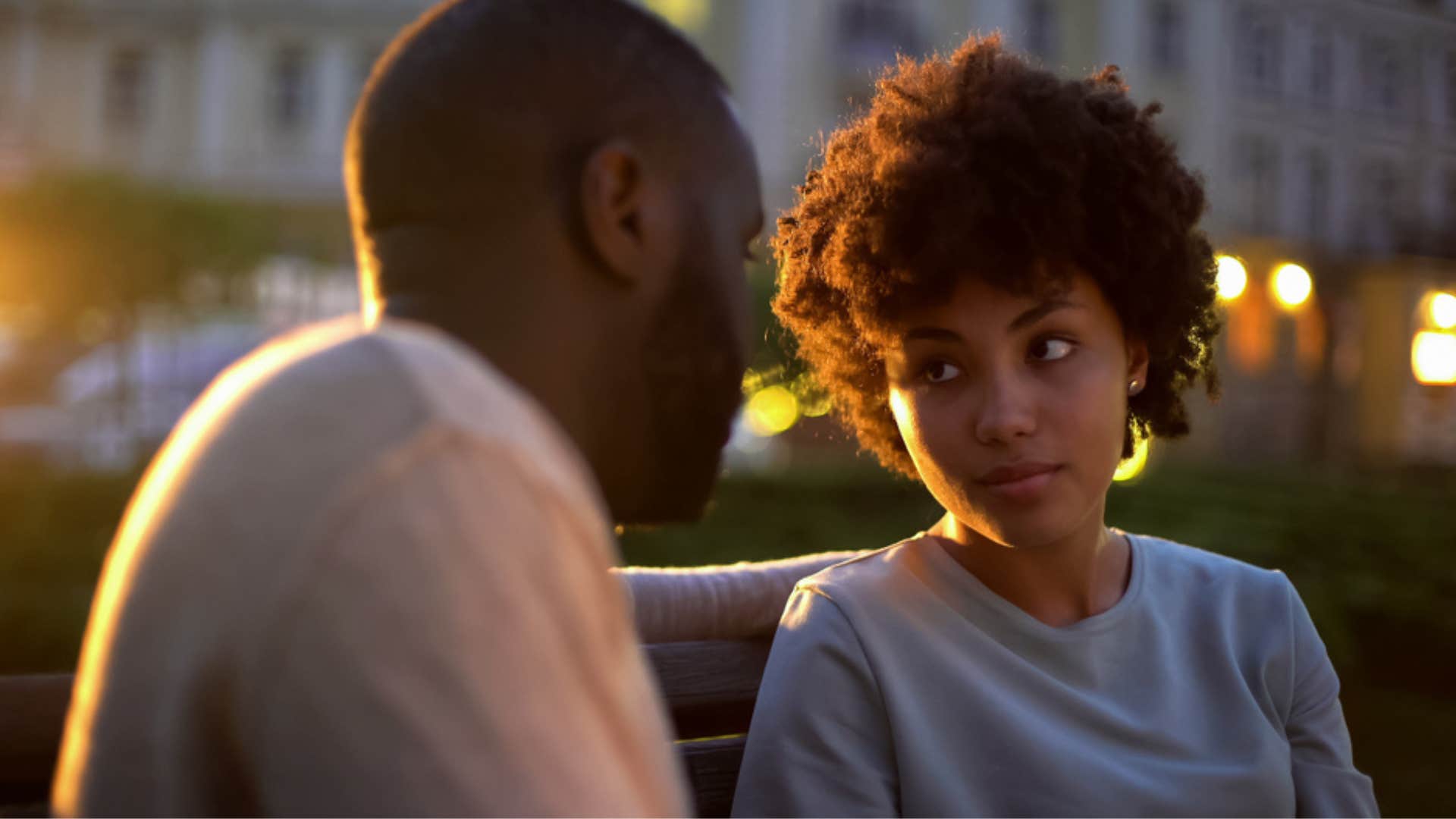 Woman talking intently to her partner.