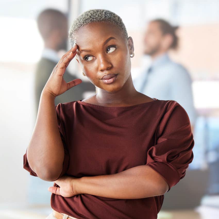 Corporate pick me woman looking annoyed at work. 