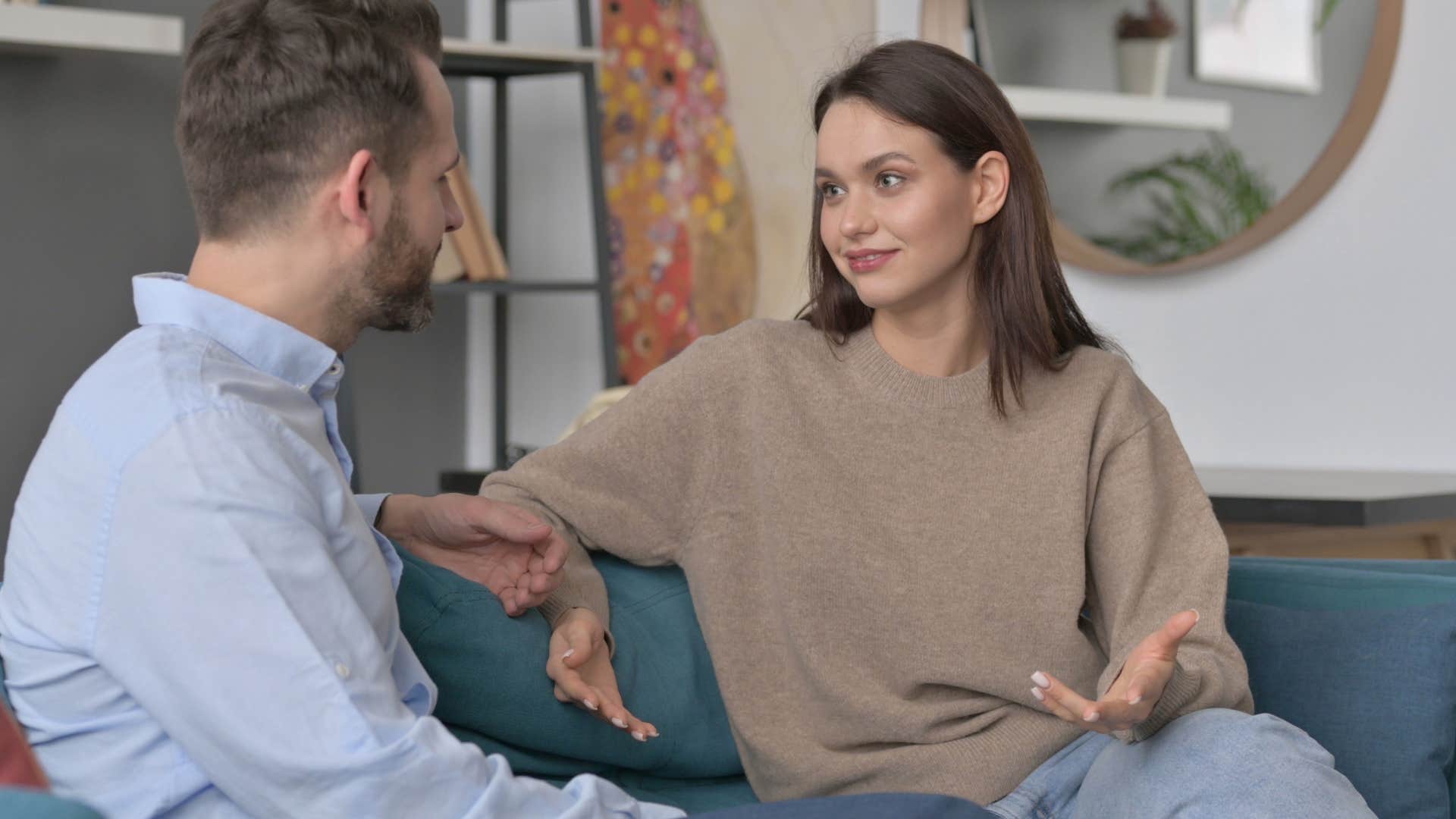 Couple having an argument on their couch