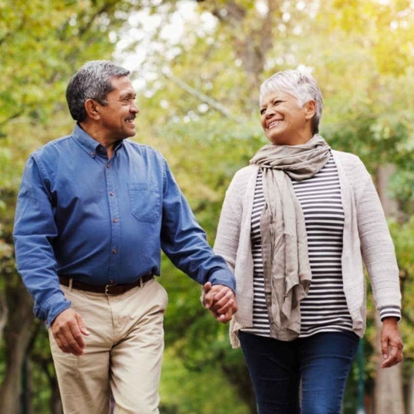 couple holding hands 