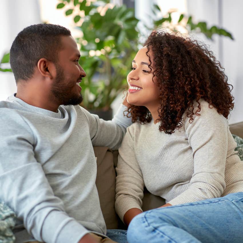 Couple smiling at each other and bonding. 