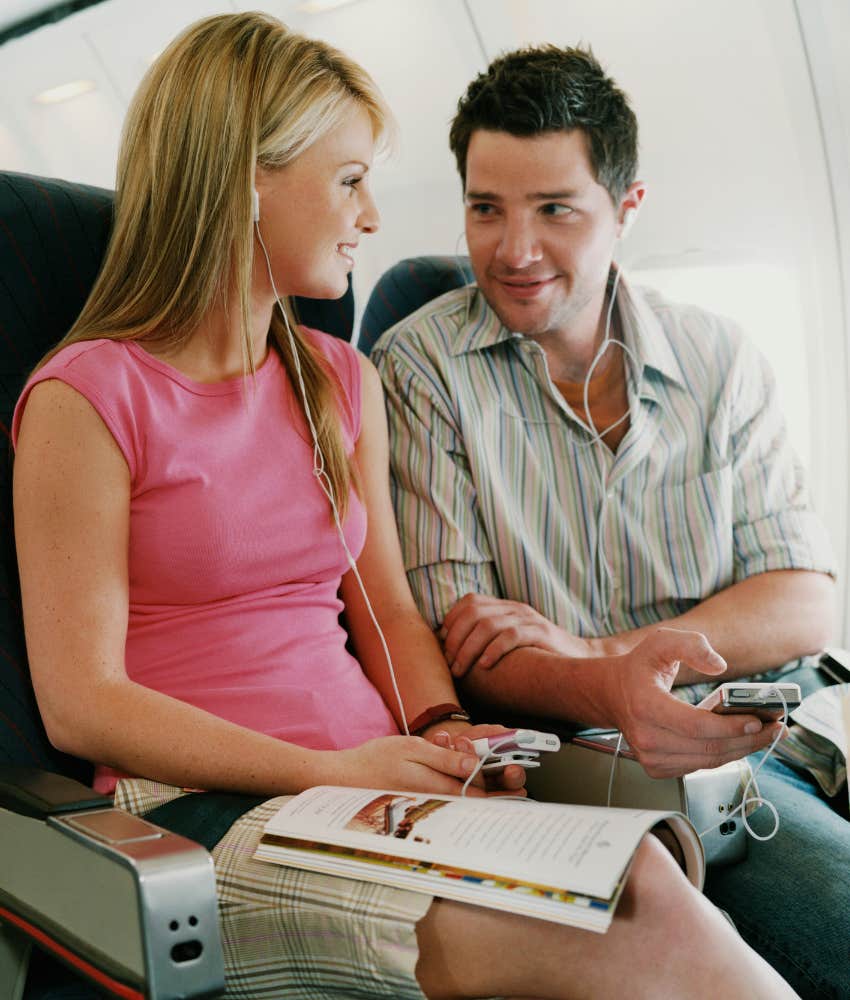 Couple sitting on a plane