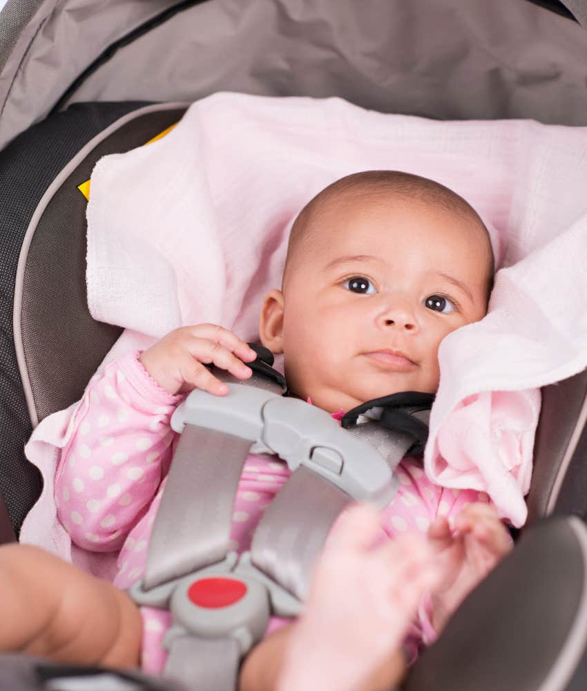 cute baby in a car seat