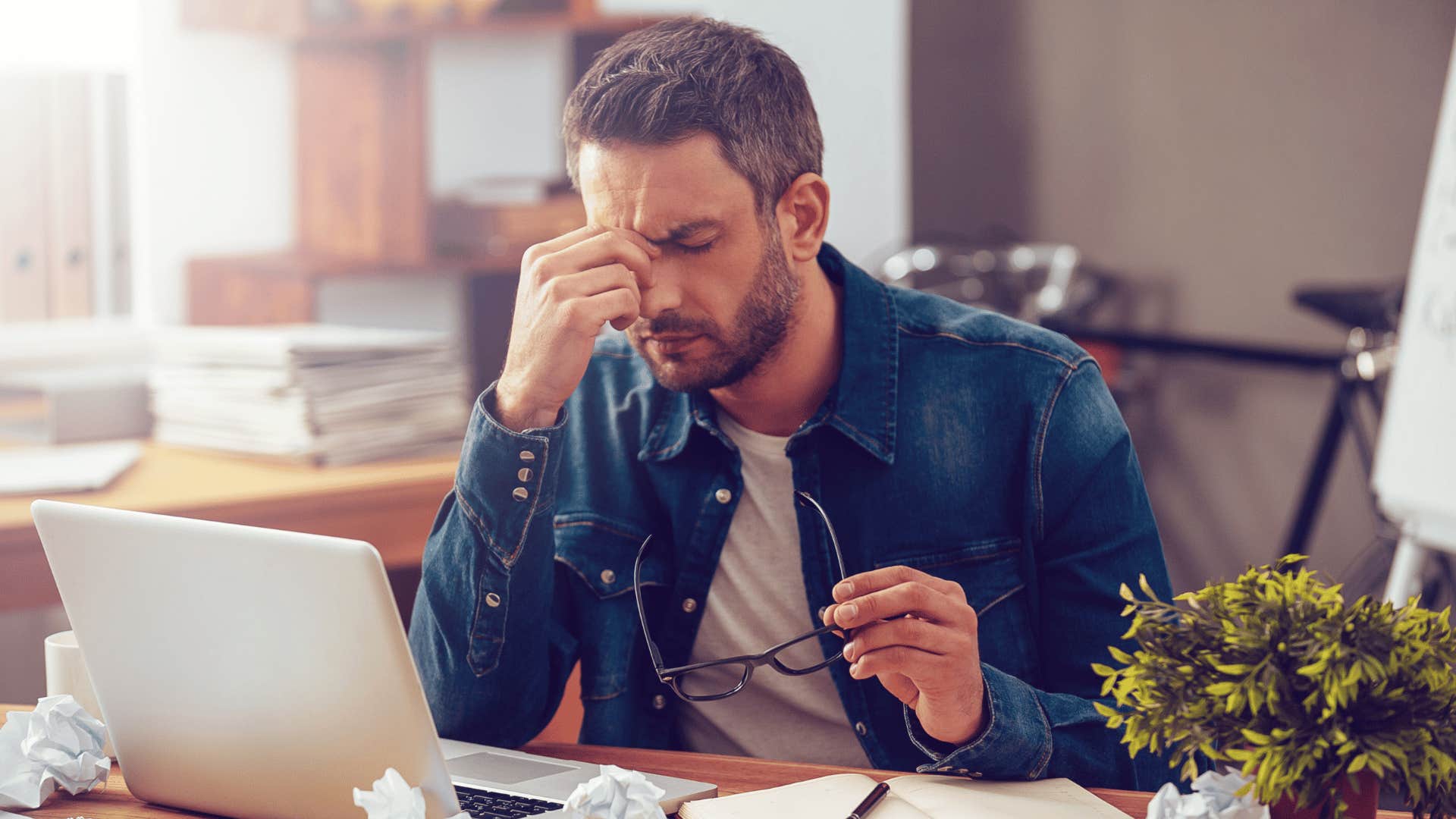 frustrated man at desk 