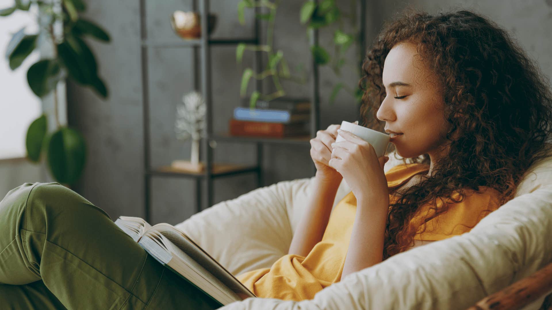 woman reading and drinking tea