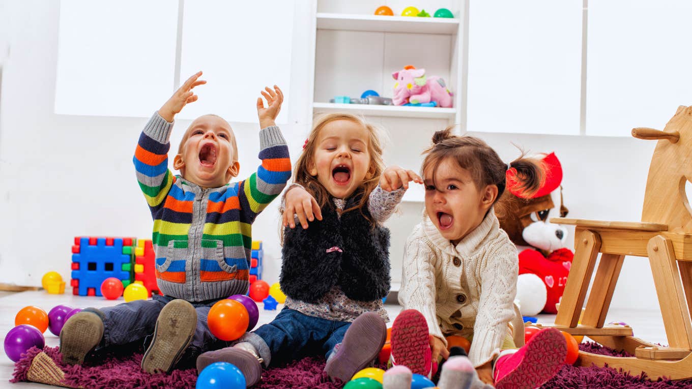 three kids having fun at daycare