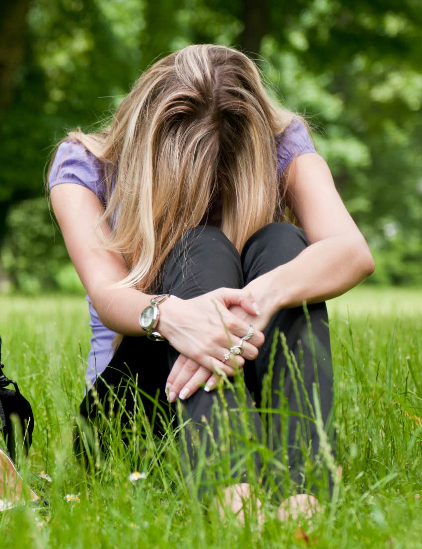 Depressed woman outside