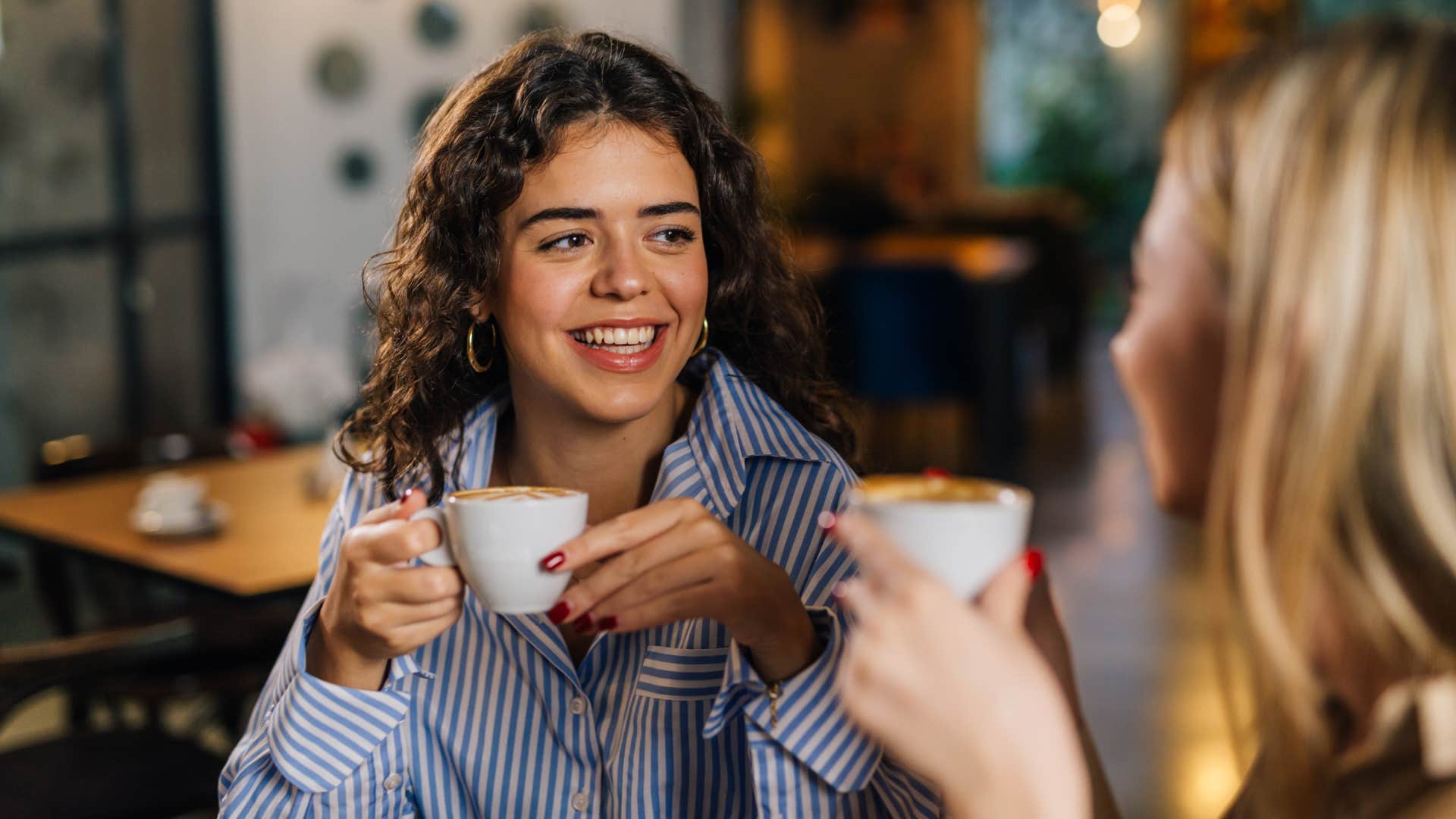 women have a face-to-face conversation