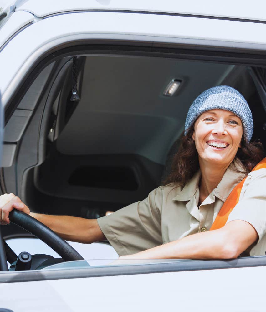 female garbage truck driver