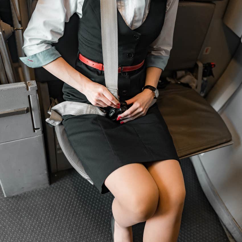 Flight attendant sitting for takeoff and landing