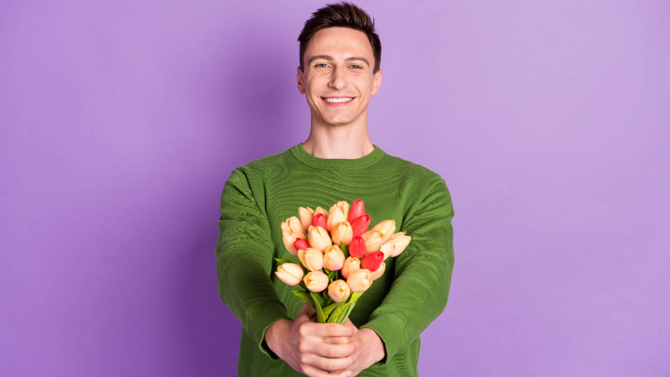 Man giving flowers