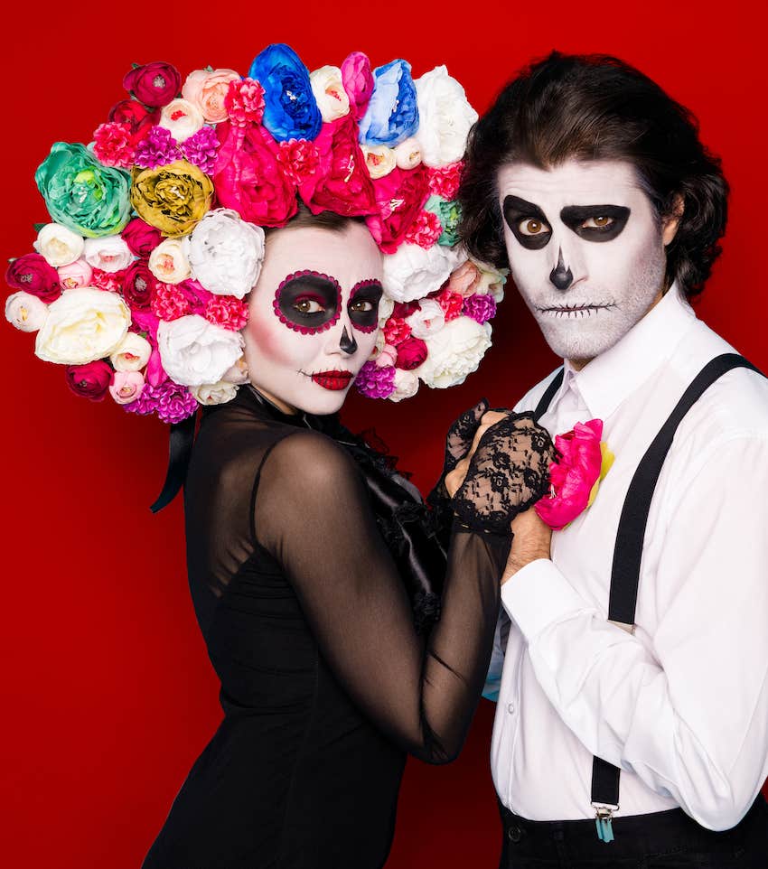 Couple in costume and face paint