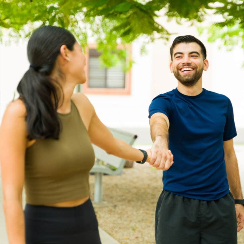 happy couple holding hands 