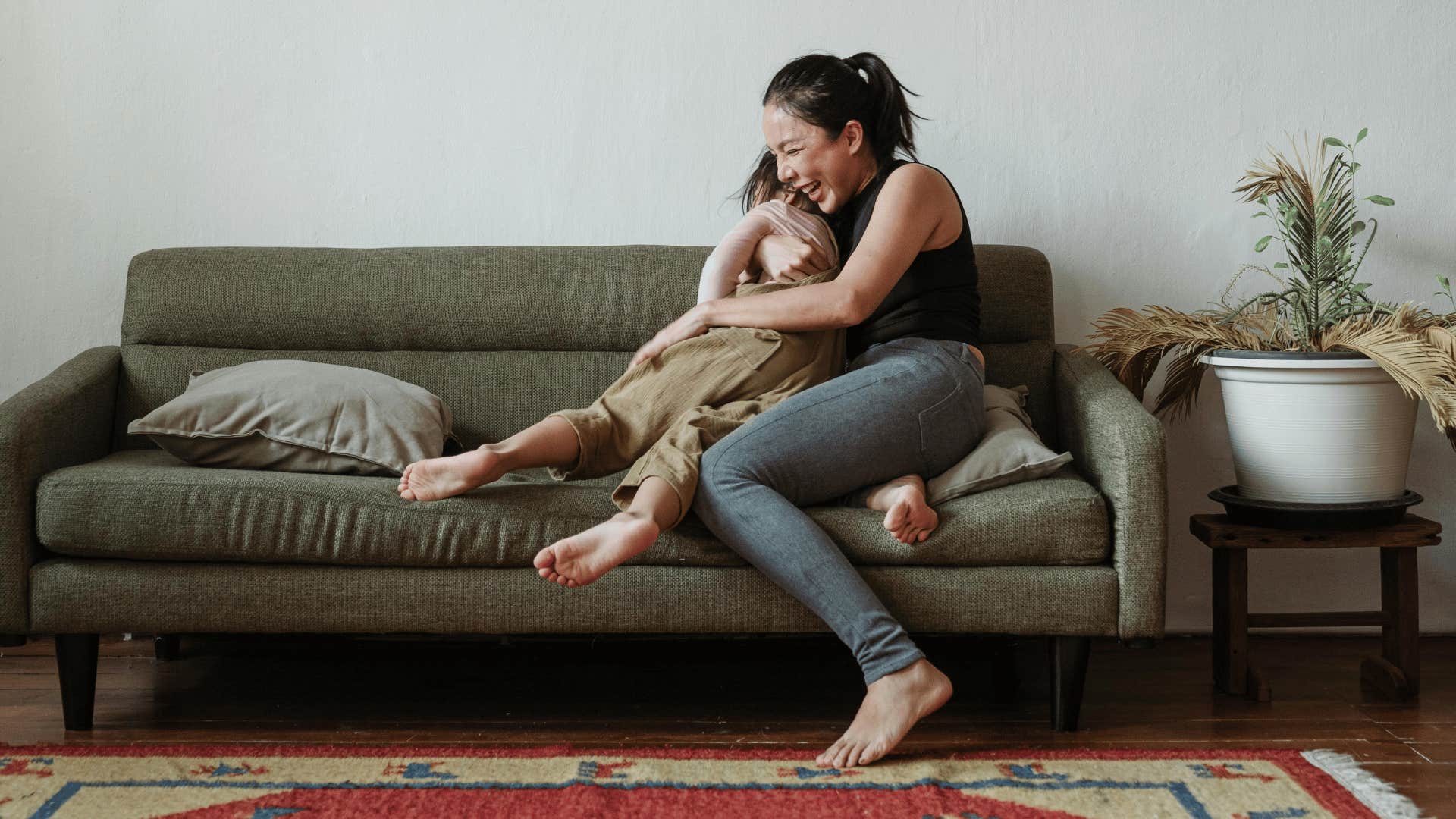 woman playing with child