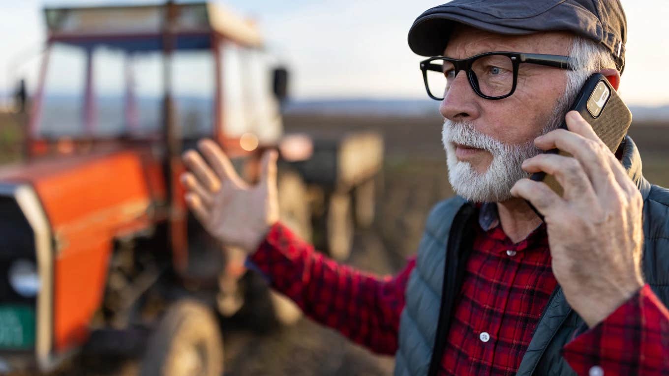 Stressed farmer on the phone