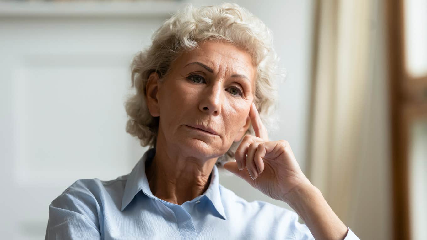 older concerned woman thinking